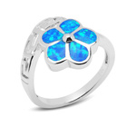 Srebrny Pierścionek Kwiatuszek z Niebieskim Opalem