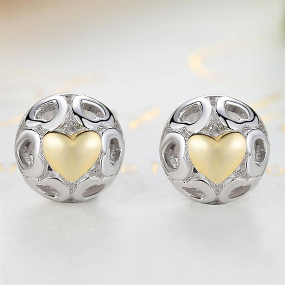 Srebrne Kolczyki Złote Serduszka