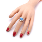 Srebrny Pierścionek Kwiat z Niebieskim Opalem