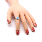 Srebrny Pierścionek Kwiatuszek z Niebieskim Opalem