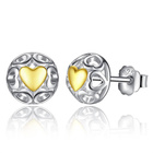 Srebrne Kolczyki Złote Serduszka
